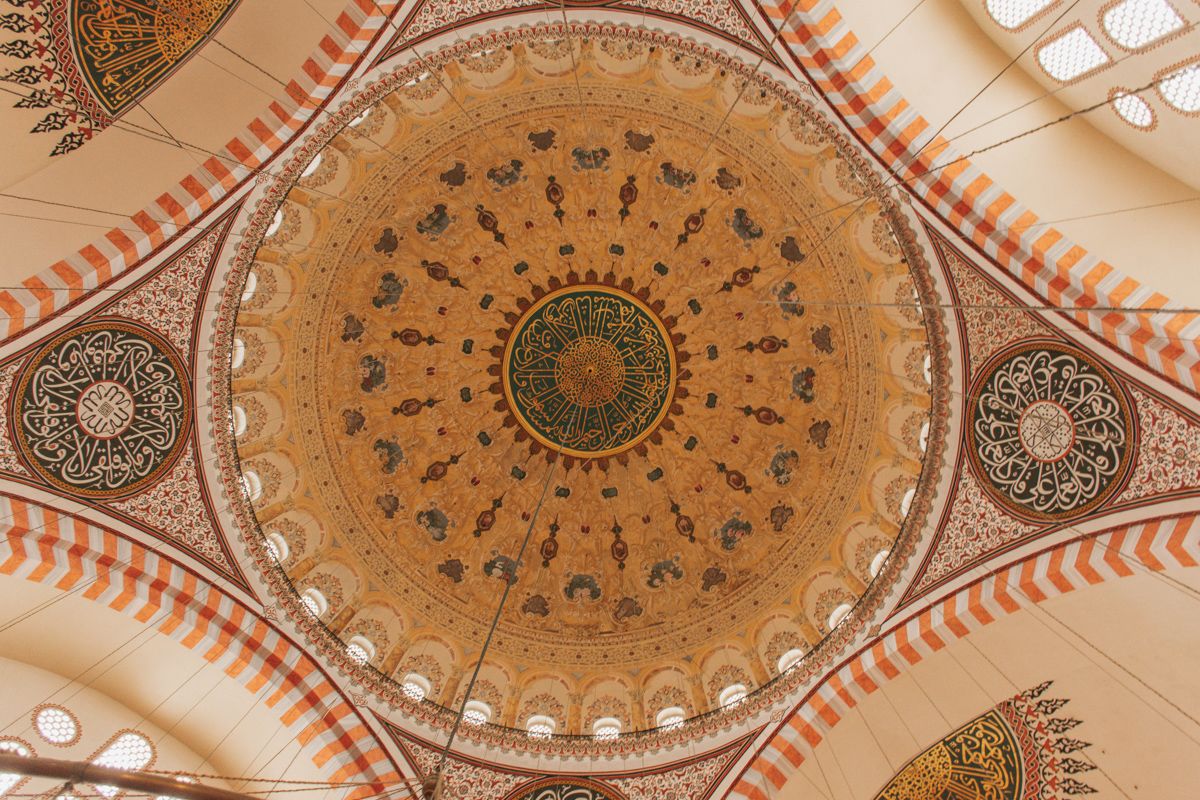 A Domed Ceiling With A Design