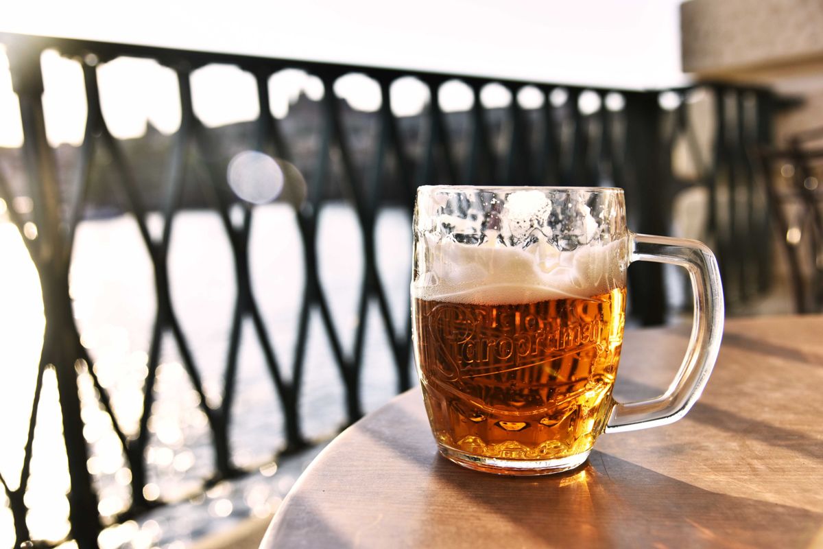 A Glass Of Beer On A Table